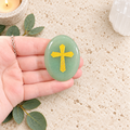 Gold Cross on Aventurine Palm