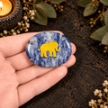 Gold Elephant on Sodalite Palm